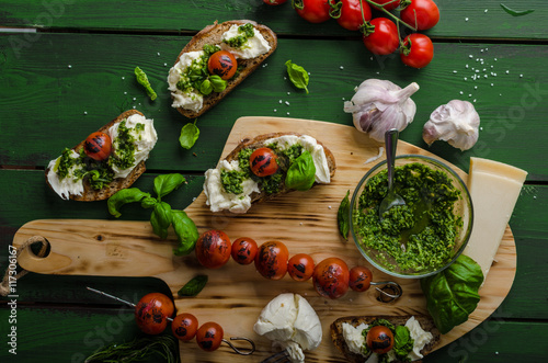 Grilled toasts with pesto