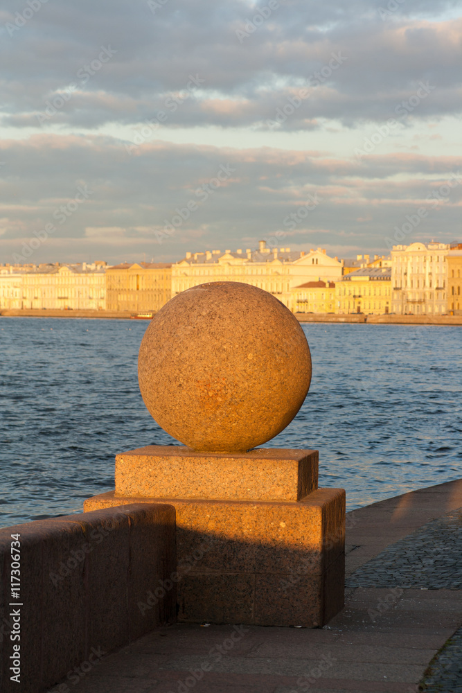 Saint - PETERSBURG, RUSSIA: Granite ball close up in the light of the setting spring sun. Vasilievsky island