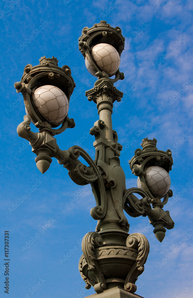Trinity Bridge. Lighting trehrozhkovy lantern. Saint Petersburg Russia.
