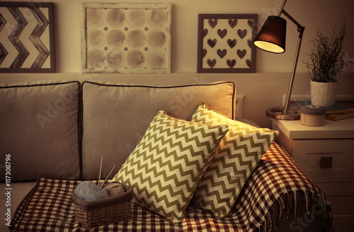 Cuadro en lienzo Comfortable sofa with pillows in the room