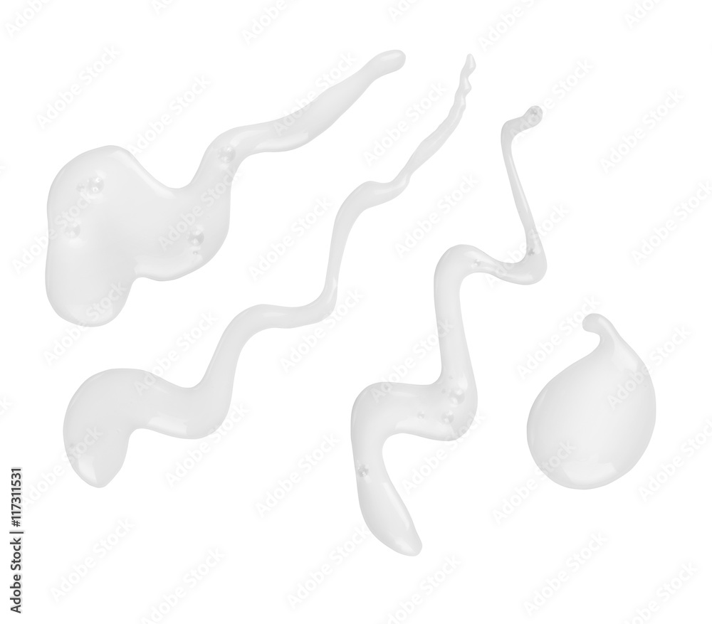 Set of multiple puddles of cosmetic cream isolated on white back Set of multiple puddles of cosmetic cream isolated on white back