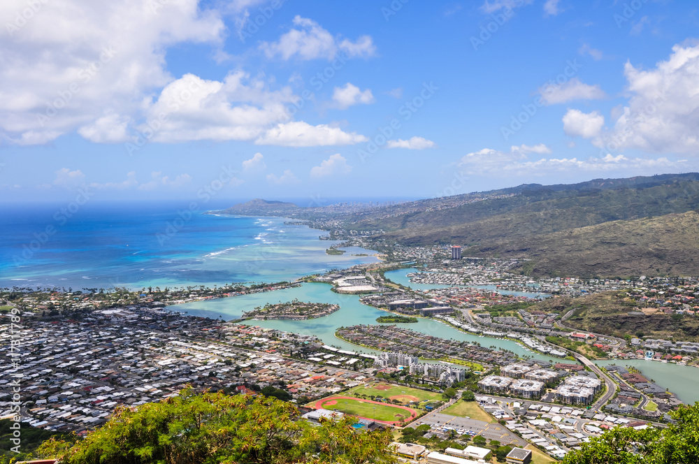View of Hawaii Kai, a largely residential area located in the City & County of Honolulu, seen from the top of Koko Head near Honolulu - Hawaii, USA.
In the background you can see Diamond Head Crater.