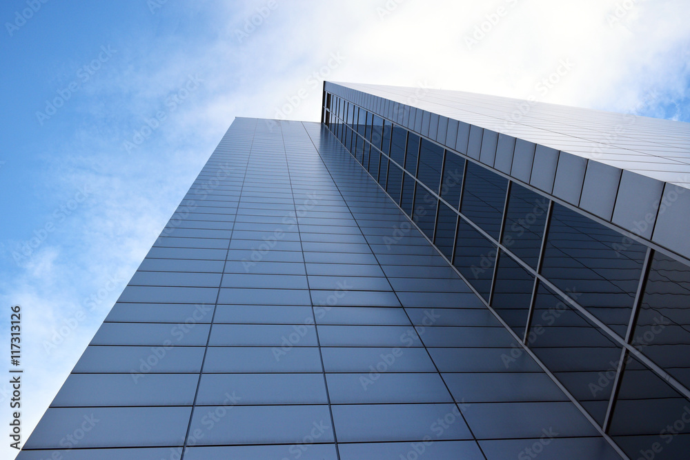 Business office building exterior against blue sky - obrazy, fototapety, plakaty 
