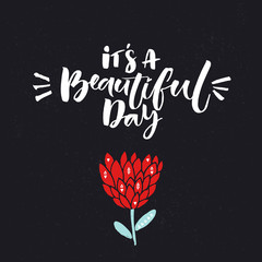 It's a beautiful day. Inspiration quote and hand drawn red flower at dark textured background.