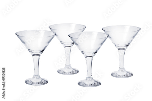 Set of four empty cocktail glasses