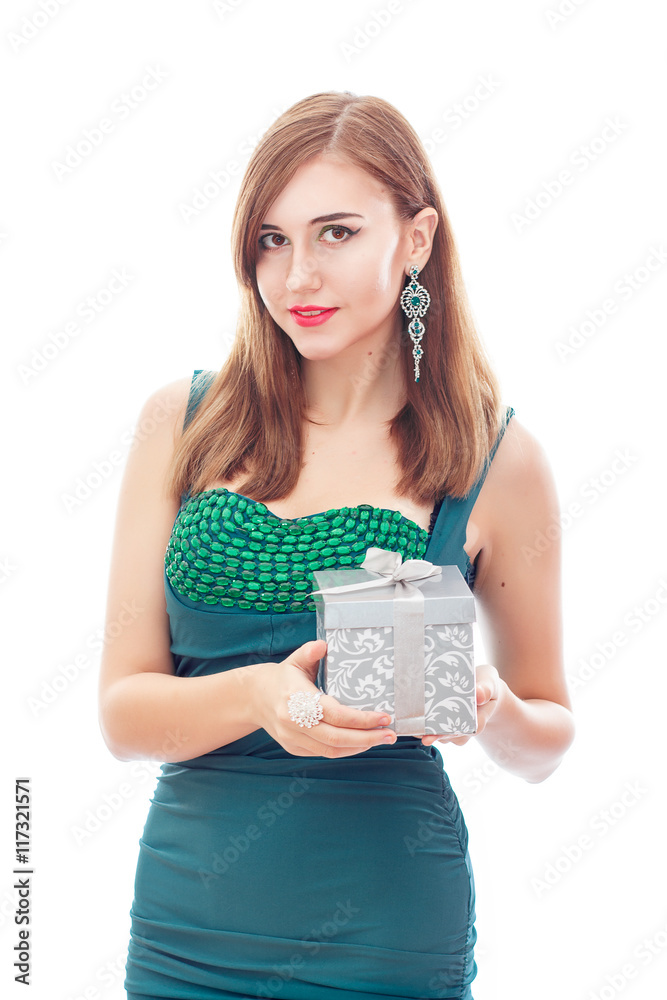 Elegant Posh Woman with Diamond Earrings And Ring. Platinum Jewelry with green And White Diamonds. Gift In Silver Box in Her Hands Elegant Posh Woman with Diamond Earrings And Ring. Platinum Jewelry with green And White Diamonds. Gift In Silver Box in Her Hands