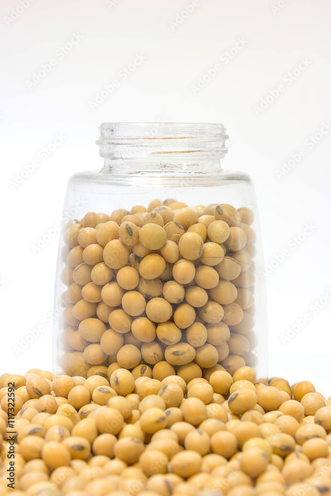 Soybean in glass bottle setup isolated on a white background. Soybean in glass bottle setup isolated on a white background.