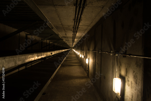 Underground tunnel with metallic pipes