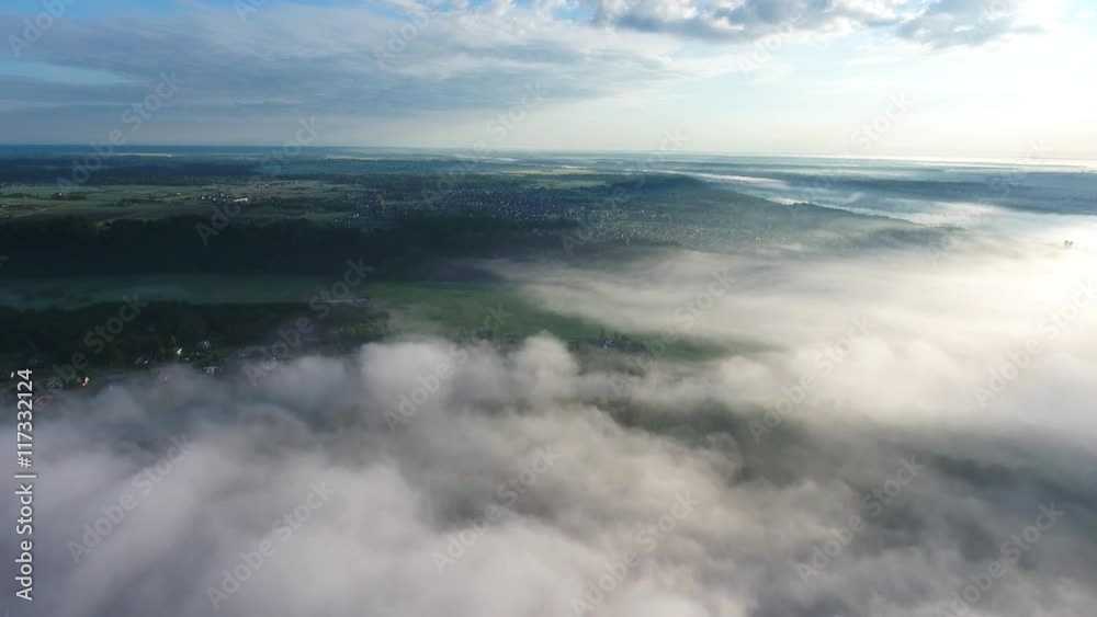 flying above landcape with mist flying above landcape with mist