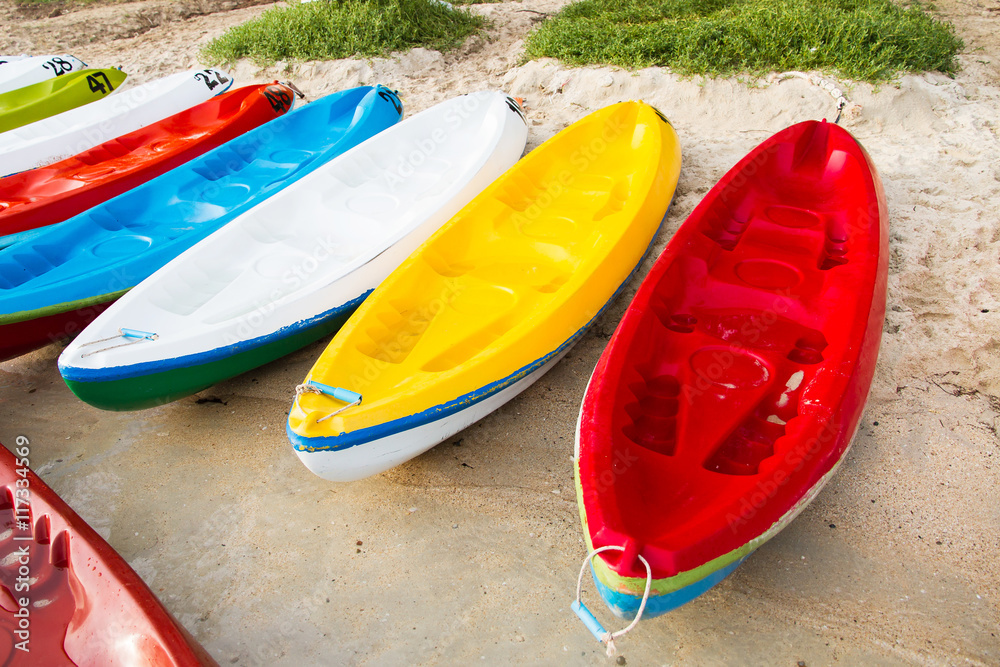 Colourful sea kayaks on the beach.Thailand Colourful sea kayaks on the beach.Thailand