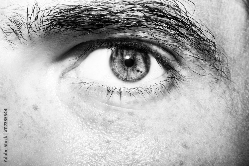 Obraz premium Image of man's eye close up.