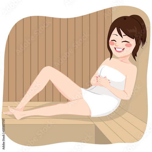 Young woman relaxing having a steam bath on sauna