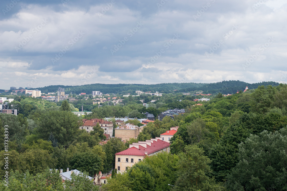 VILNIUS, LITHUANIA - JULY, 2016: Aerial View of Vilnius. Cityscape with residential buildings, trees and sky with clouds