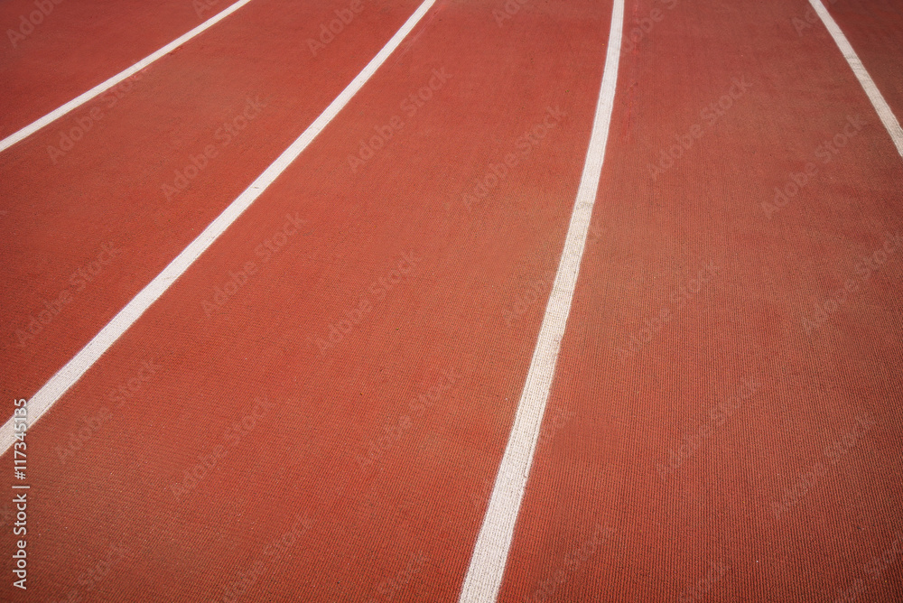 Red track in stadium for athlete, jogging, relax, walk and running
