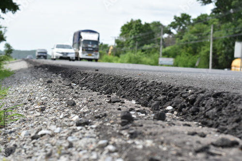 Cross section of asphalt road (top layer is an asphalt and bottom layer is an crushed rock )