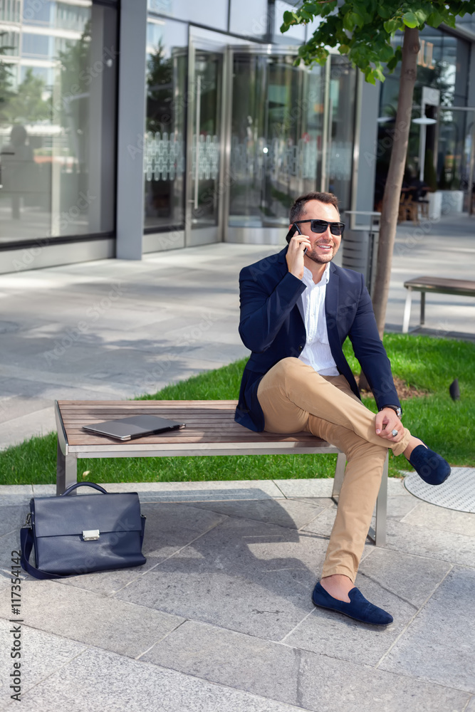 Businessman talking on mobile phone Businessman talking on mobile phone