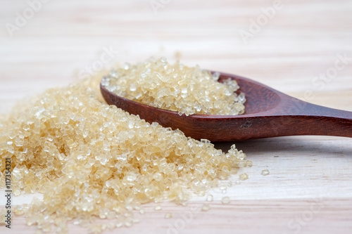 brown sugar heap on wooden table