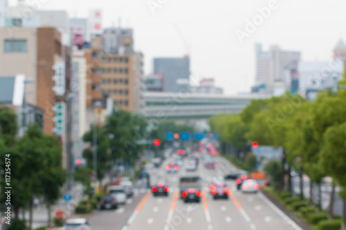 Abstract blurred background with car on road, concept transporta © nonchanon