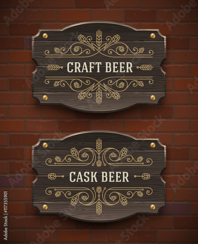 Old wooden signboards with craft beer flourish emblem - vector illustration
