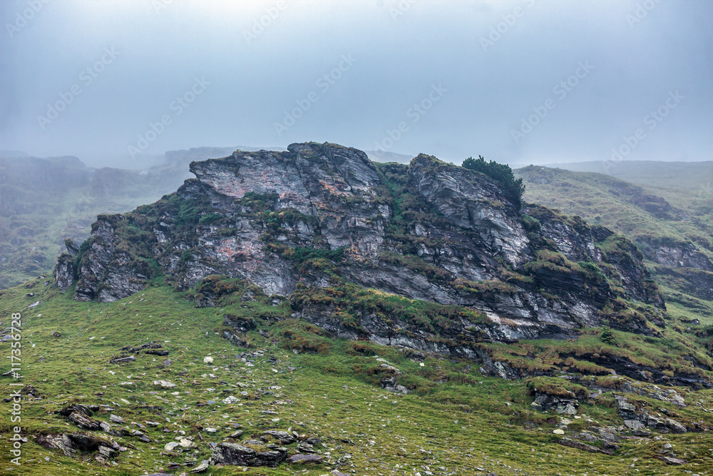 Fototapeta premium Mountains in the fog