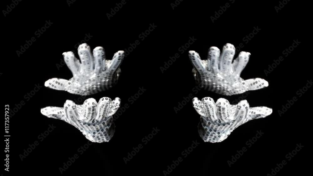 sparkling silver gloved hands moving sparkling silver gloved hands moving