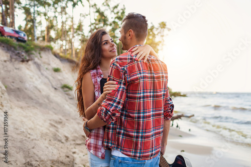 affectionate young couple on a road trip