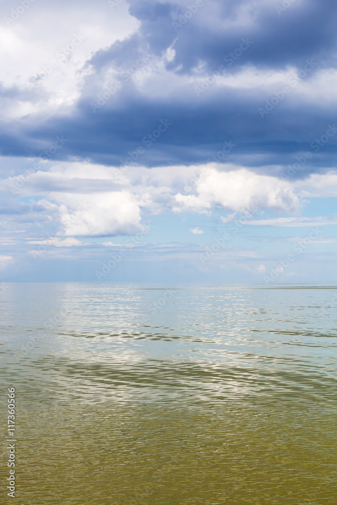 Azov Sea waterscape with green water and blue sky Azov Sea waterscape with green water and blue sky