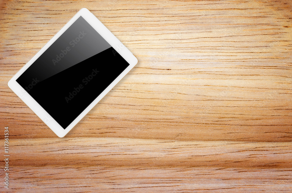 Digital tablet on wooden background. Digital tablet on wooden background.
