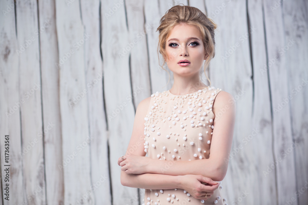 Fototapeta premium young beautiful bride with make-up and styling