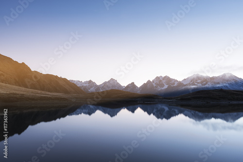 Fototapeta Naklejka Na Ścianę i Meble -  Morning landscape with a mountain lake in Georgia