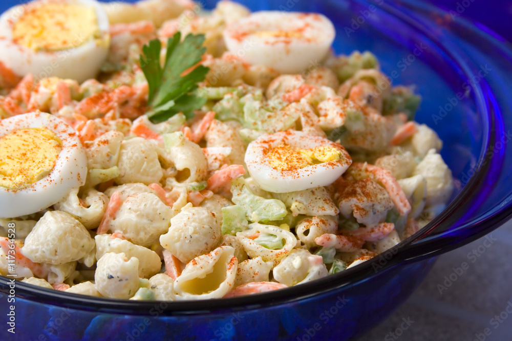 Macaroni Salad with Hard-boiled Eggs – A typical midwestern macaroni salad, topped with hard-boiled egg slices and paprika.