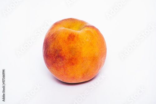 juicy peach on a white background