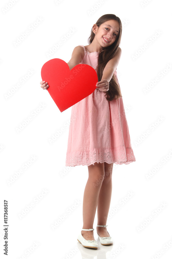 Lovely girl holding a red heart shape, over white background. Love concept Lovely girl holding a red heart shape, over white background. Love concept