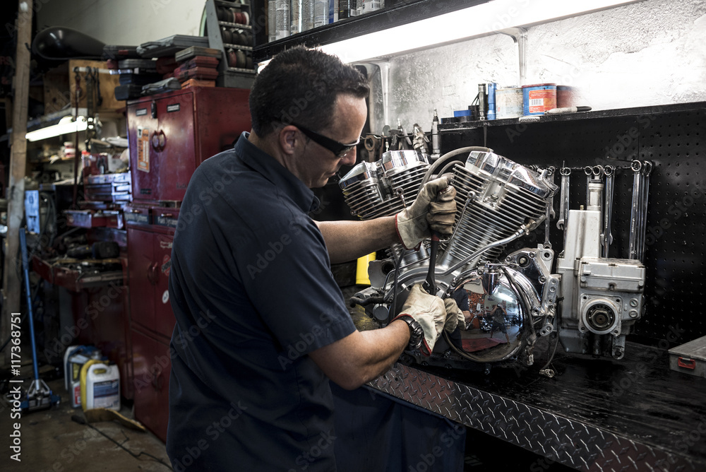 Motorcycle mechanic working