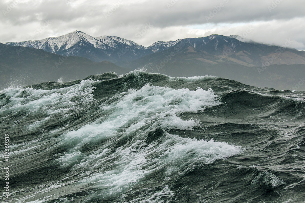 storm surge on the background of the Northern mountains