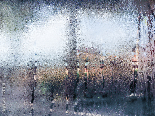 Water drops from home condensation on a window photo