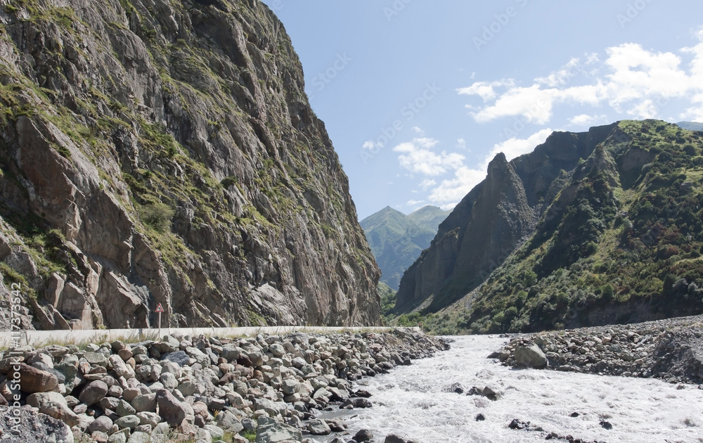 Dariali gorge.The Terek river and Georgian Military road connecting Georgia and Russia Dariali gorge.The Terek river and Georgian Military road connecting Georgia and Russia