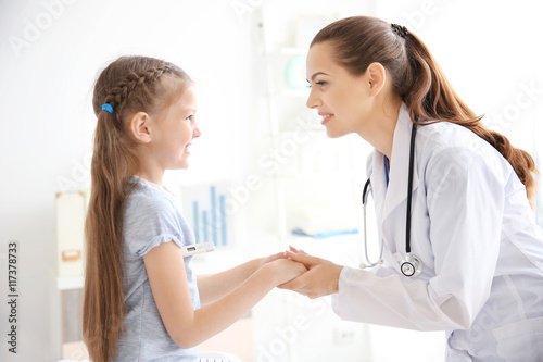 Cute girl visiting a doctor
