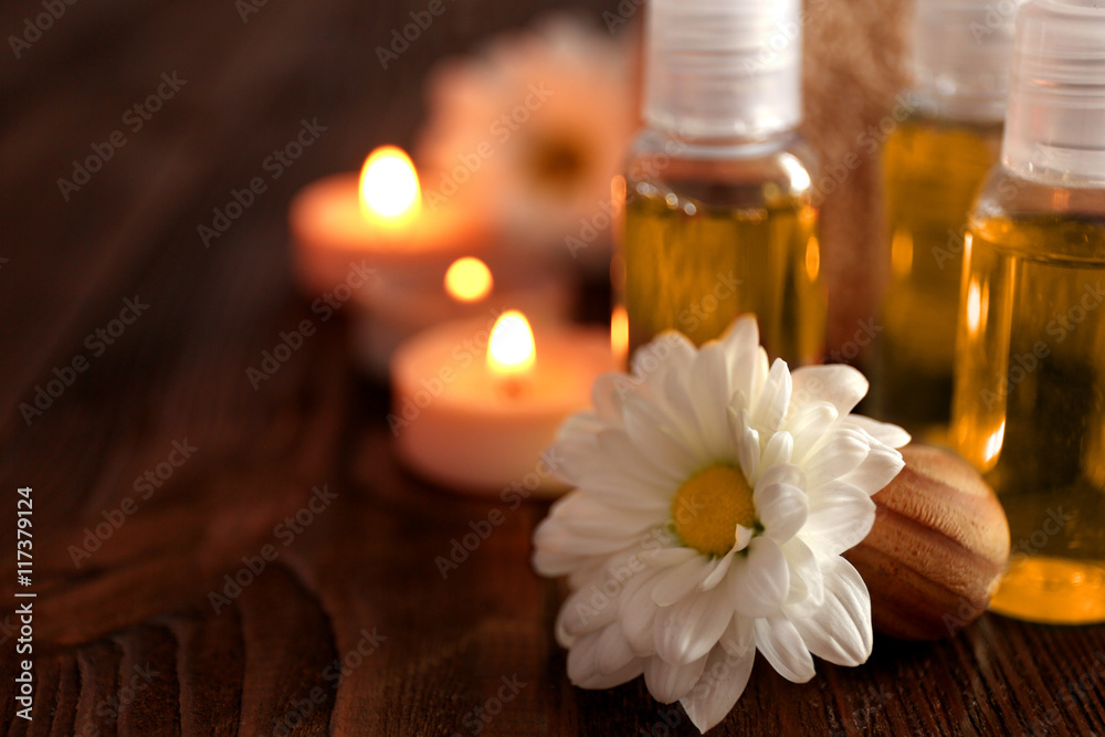 Beautiful spa set with flower on wooden table Beautiful spa set with flower on wooden table