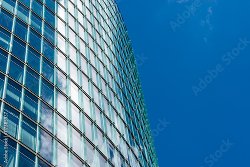 Modern Business buildings with sky background and sun