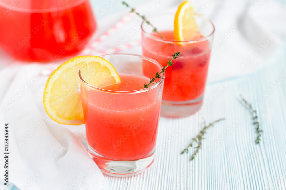 Lemonade in glasses, decorated with lemon ring Lemonade in glasses, decorated with lemon ring