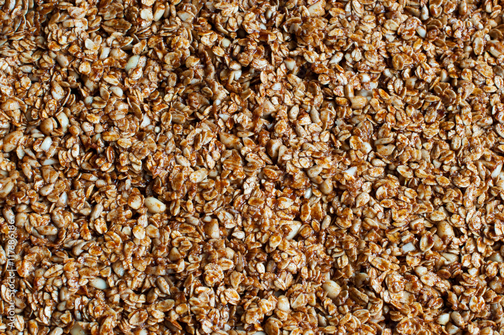 Textured food background. Uncooked granola Textured food background. Uncooked granola