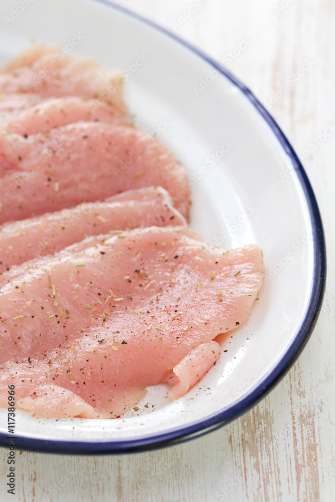 raw meat on white dish on white background raw meat on white dish on white background