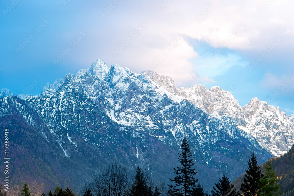 Beautiful landscape view with snowed up mountains in Triglav national park in Slovenia. Traveling slovenian Alps