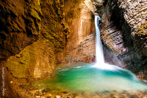 Kozjak waterfall in Triglav natioanl park in Slovenia. Long exposure technic with motion blurred water photo