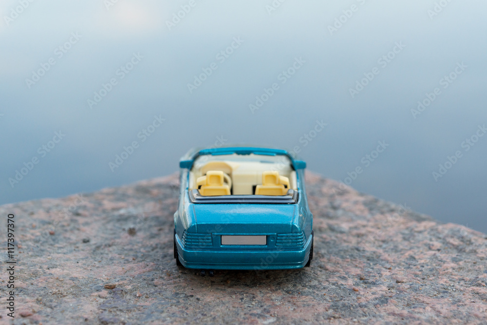 Blue Car against Blue Background Blue Car against Blue Background