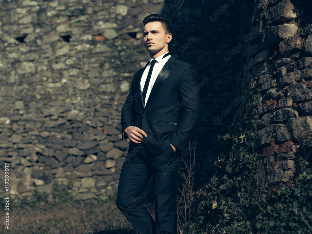 Young man poses outdoor Young man poses outdoor