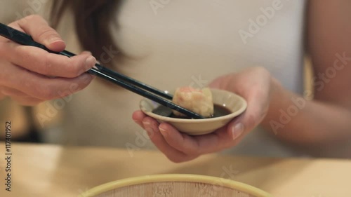 xiaolongbao,steamed dumpling with soy sauce photo