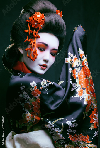 Canvas-taulu young pretty geisha in kimono