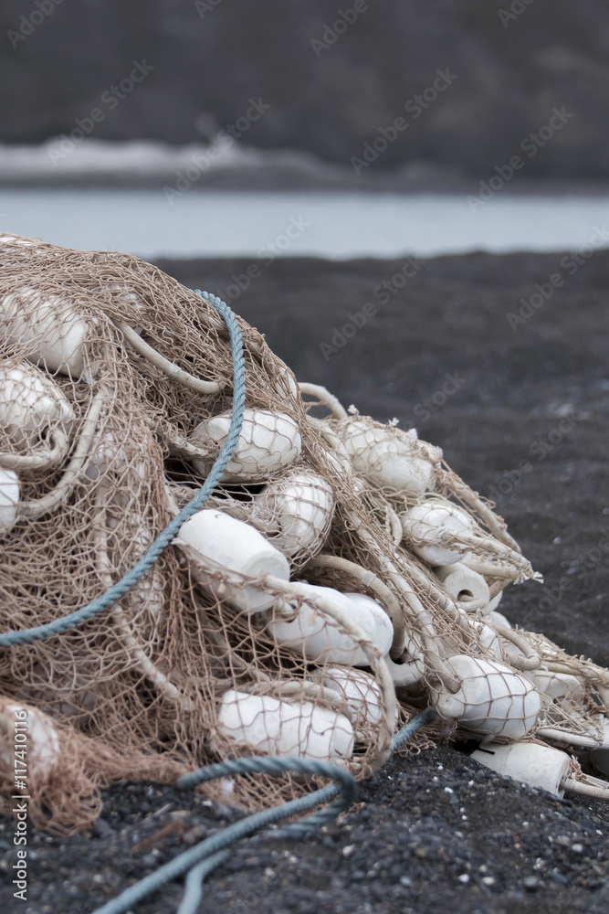 Fototapeta premium fishing net on the shore